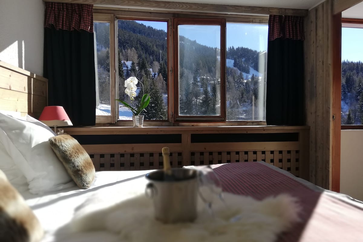 premium bedding, desk, blackout curtains, soundproofing