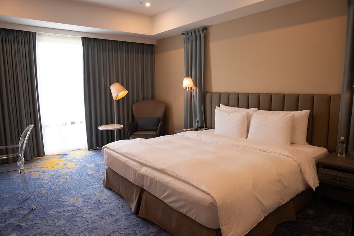 Deluxe tweepersoonskamer | Luxe beddengoed, donzen dekbedden, pillowtop-bedden, een minibar