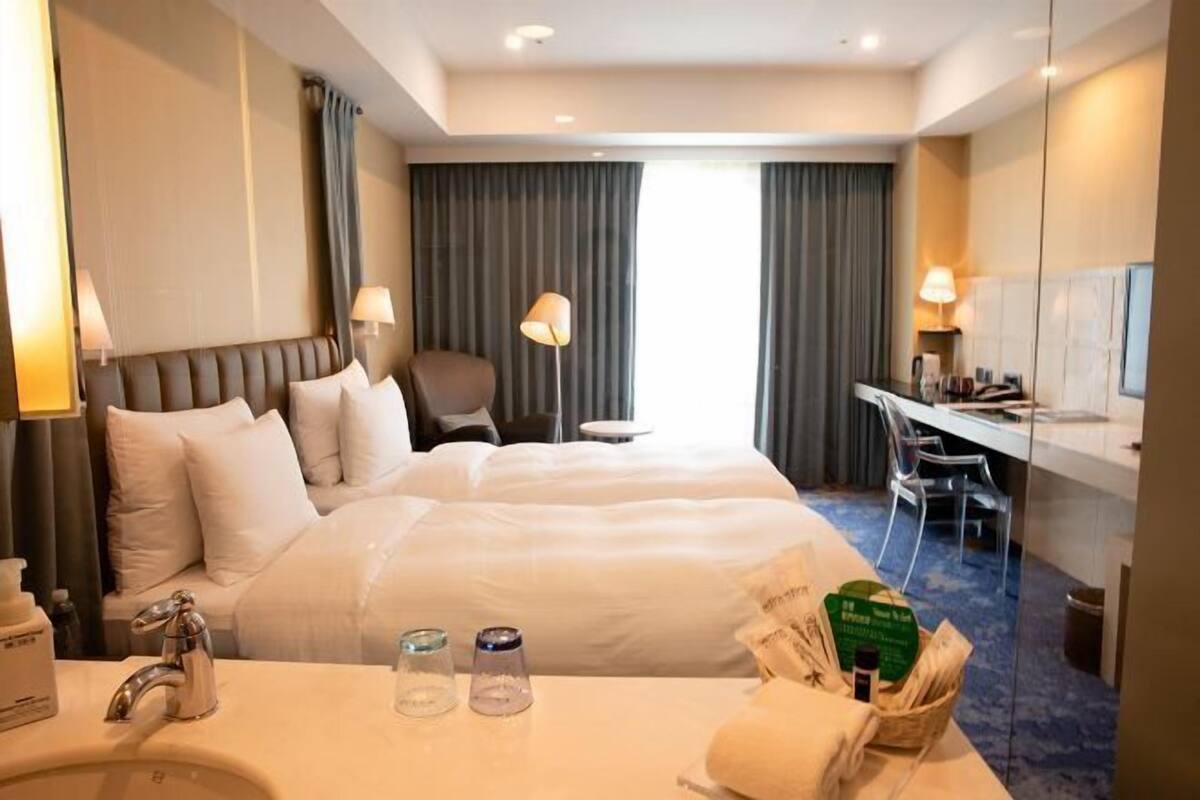 Premium bedding, down comforters, pillowtop beds, minibar