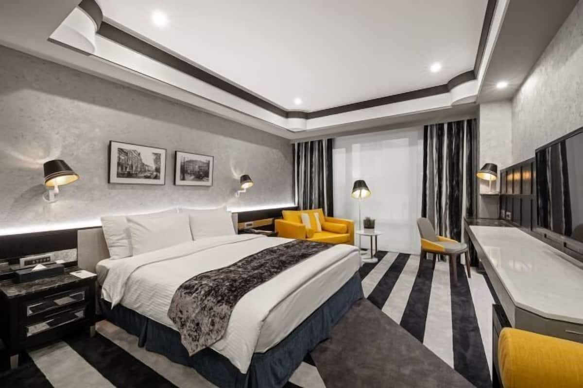 Luxe beddengoed, donzen dekbedden, pillowtop-bedden, een minibar