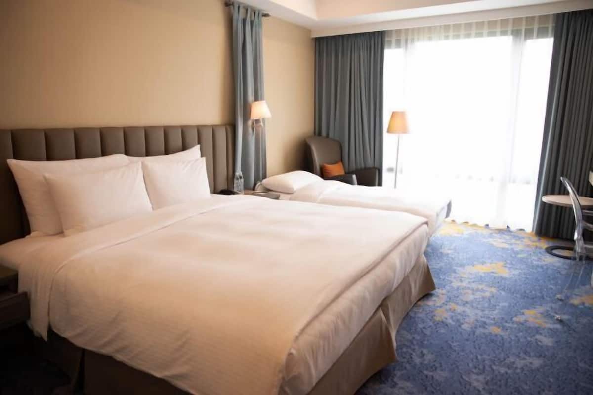 Luxe beddengoed, donzen dekbedden, pillowtop-bedden, een minibar