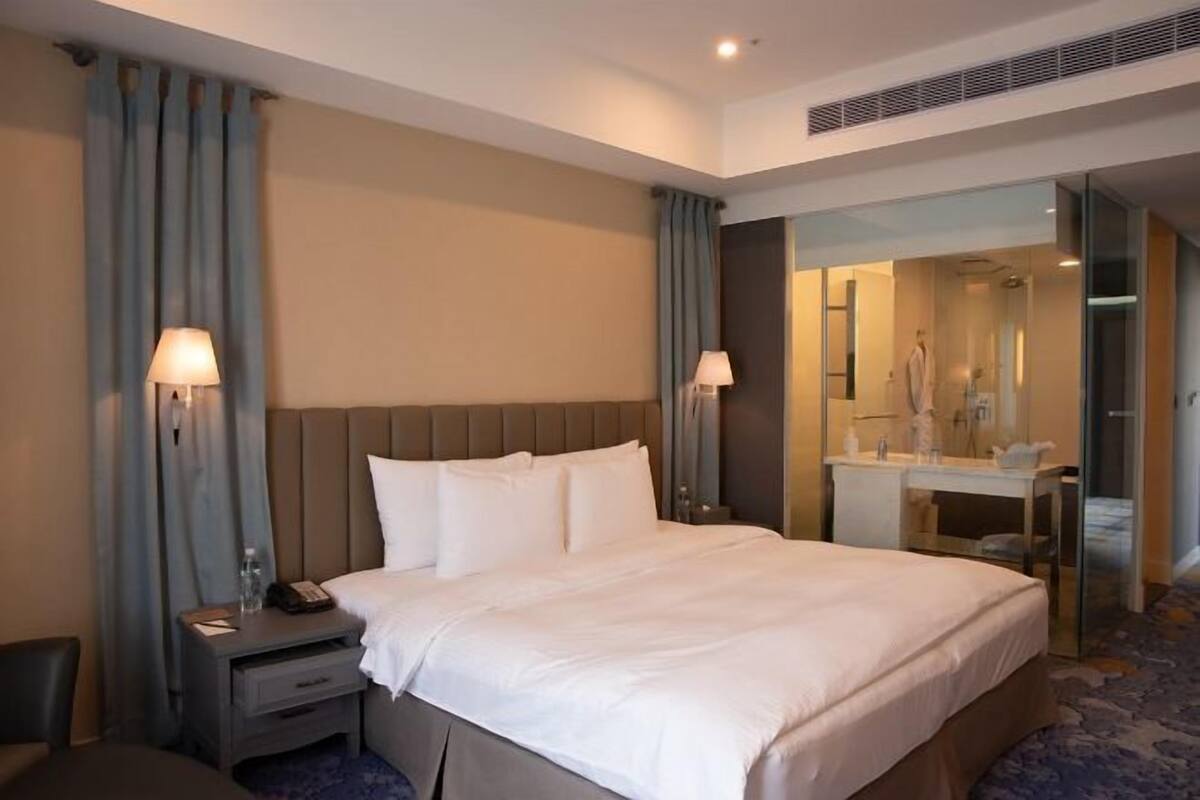 Premium bedding, down comforters, pillowtop beds, minibar