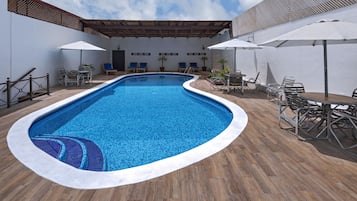 Outdoor pool, open 7 AM to 9:30 PM, pool umbrellas, sun loungers