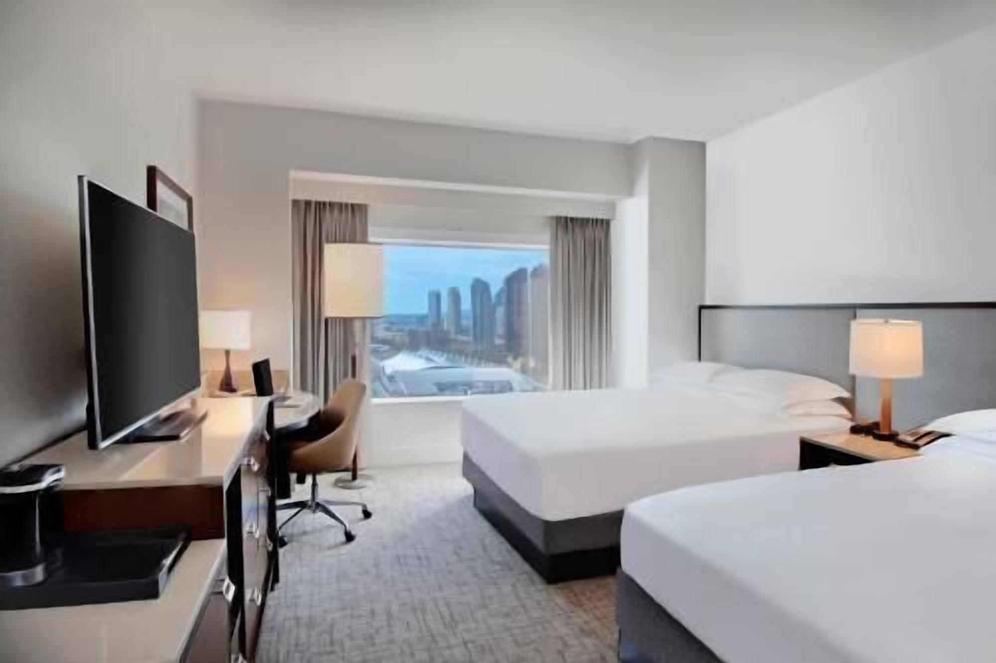 Premium bedding, in-room safe, desk, soundproofing