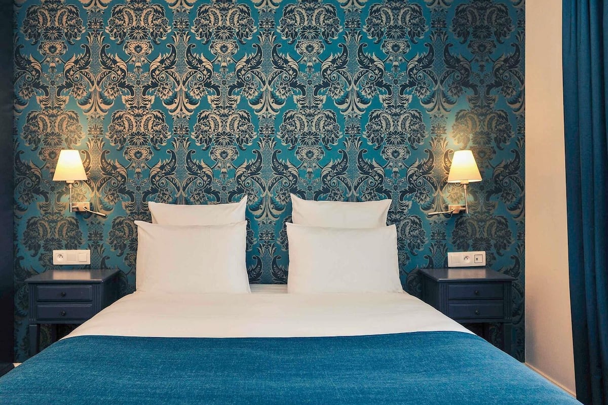 Chambre, plusieurs lits