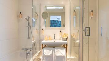 Eco-friendly toiletries, hair dryer, towels