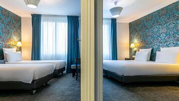 Chambre, plusieurs lits | Literie de qualité supérieure, coffres-forts dans les chambres, bureau