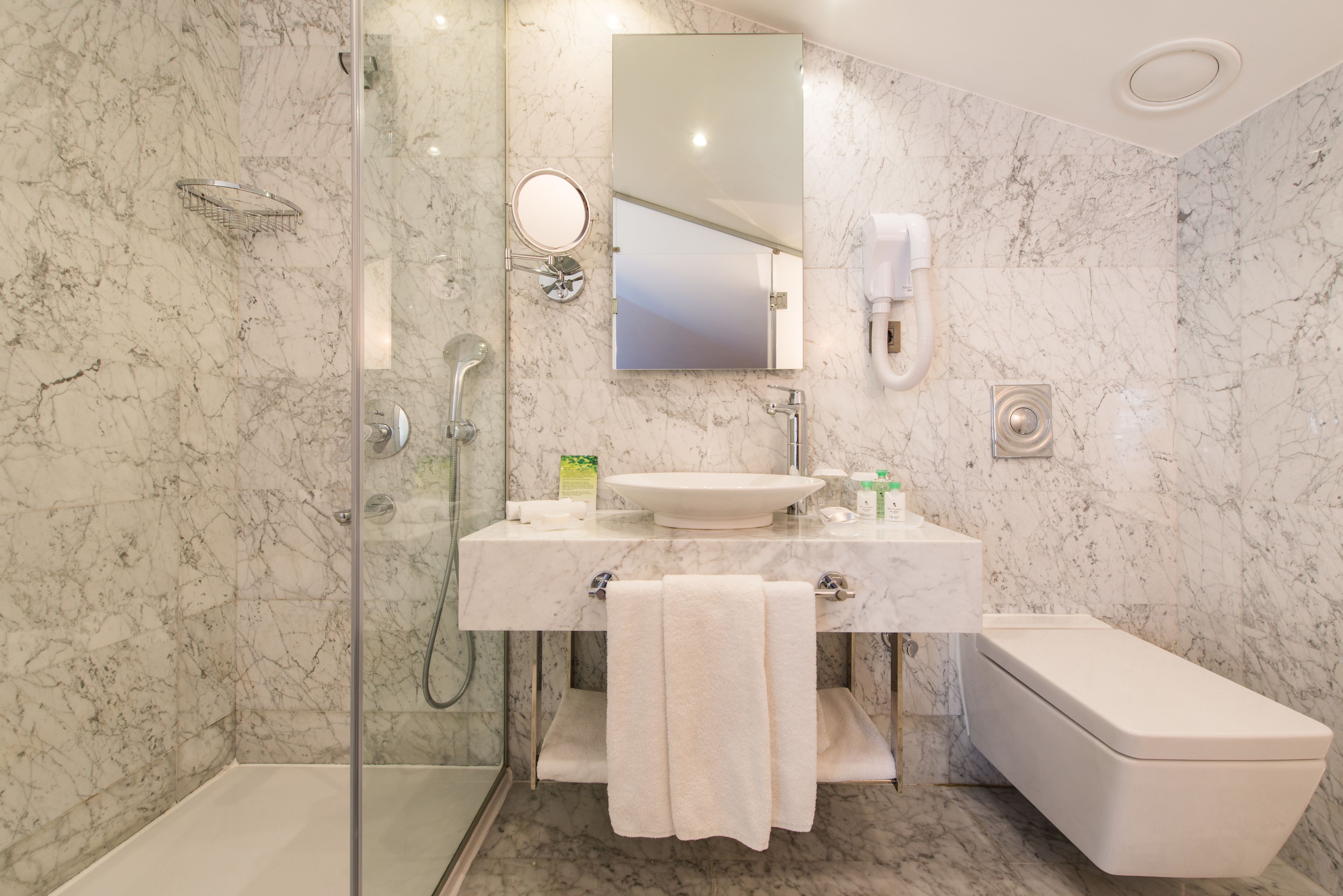 shower, rainfall showerhead, designer toiletries, hair dryer