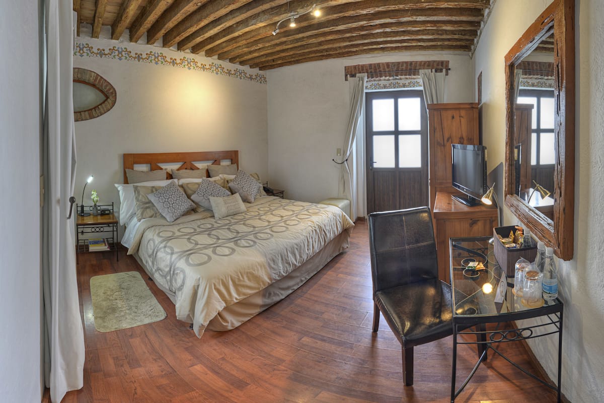 junior suite, 1 king bed | 1 bedroom, premium bedding, in-room safe, individually decorated