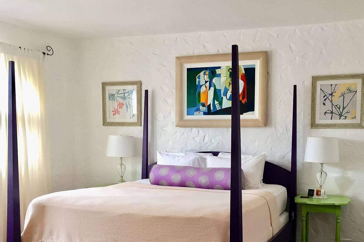 Two Bedroom Garden Suite | Minibar, in-room safe, desk, laptop workspace
