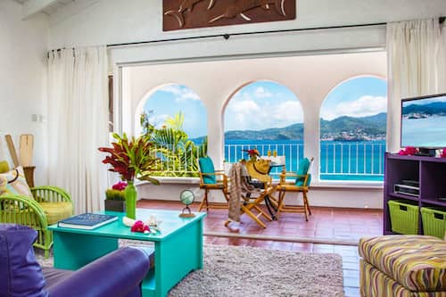 Deluxe Villa, 2 Bedrooms, Balcony, Ocean View | Living area | 42-inch flat-screen TV with cable channels, TV, DVD player