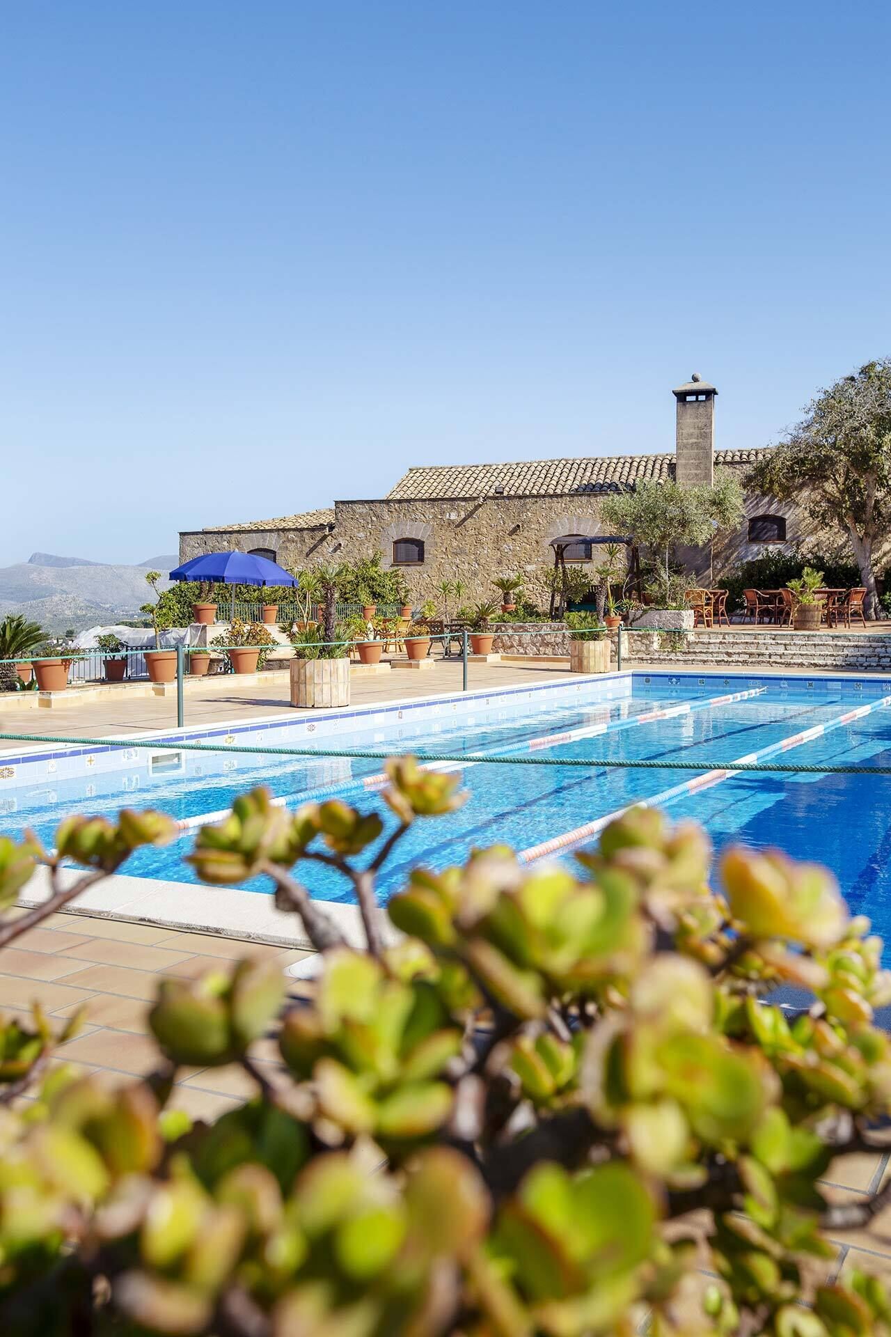 Seasonal outdoor pool, pool umbrellas