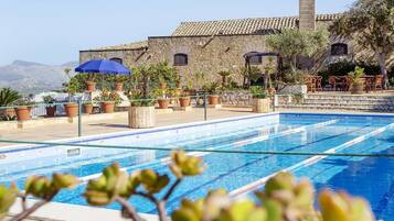 Seasonal outdoor pool, pool umbrellas