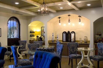 Sitting area in hotel lobby at Andreas Hotel & Spa