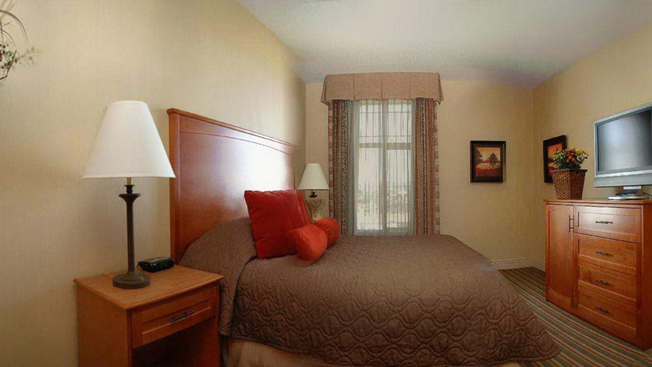 premium bedding, pillow-top beds, desk, blackout curtains