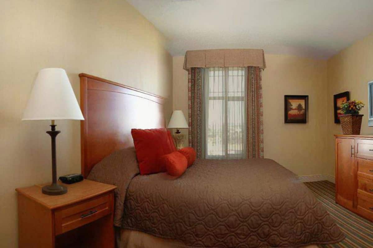 premium bedding, pillow-top beds, desk, blackout curtains