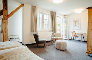 Dreibettzimmer | Wohnbereich | Flachbildfernseher, Fußbodenheizung