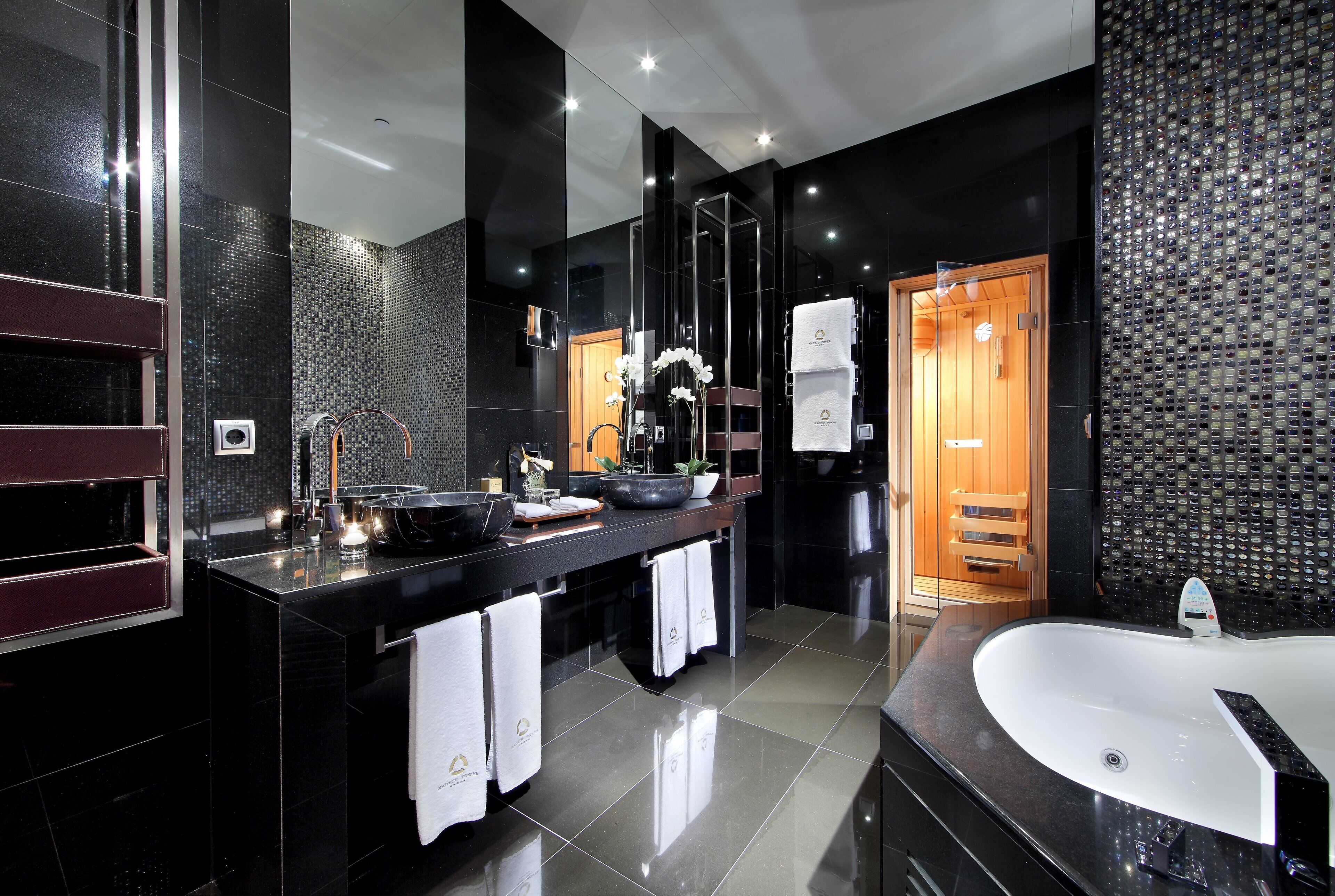 separate bathtub and shower, designer toiletries, hair dryer, towels