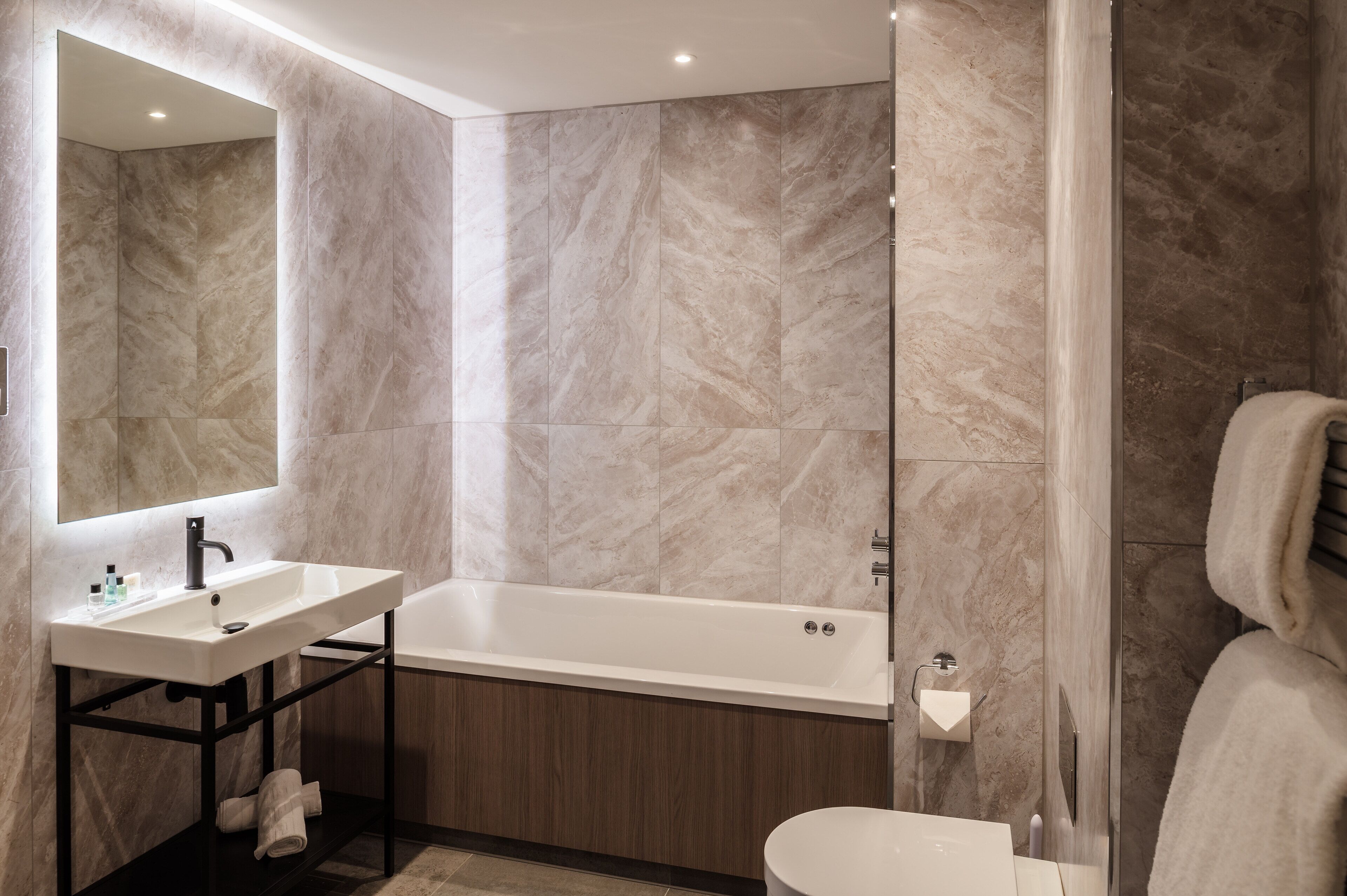 luxury suite | bathroom | free toiletries, hair dryer, towels