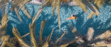2 outdoor pools, pool umbrellas, pool loungers