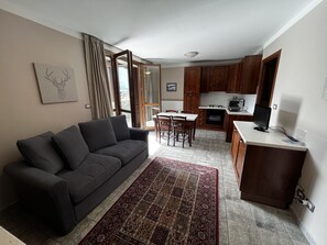 Standard Apartment, 1 Bedroom (4 people) | Living area | LCD TV, pay films - Chalet Edelweiss (Sestriere)