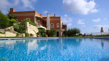 Seasonal outdoor pool, pool umbrellas, sun loungers