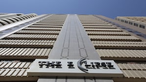 A high-rise building with a prominent sign reading "THE ECLIPSE". - The Eclipse Boutique Suites (Abu Dhabi)