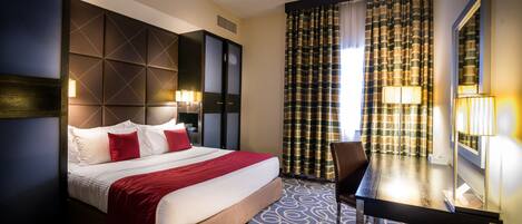 Pillow-top beds, minibar, in-room safe, desk