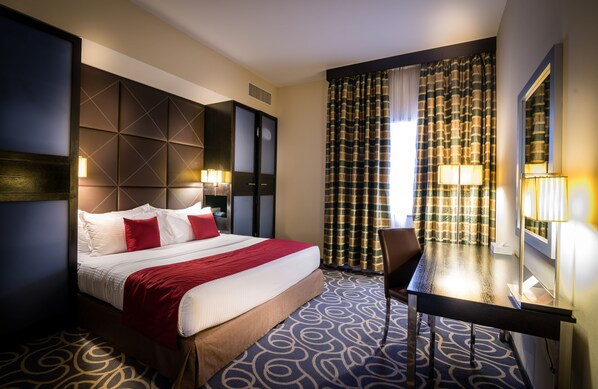 Pillow-top beds, minibar, in-room safe, desk