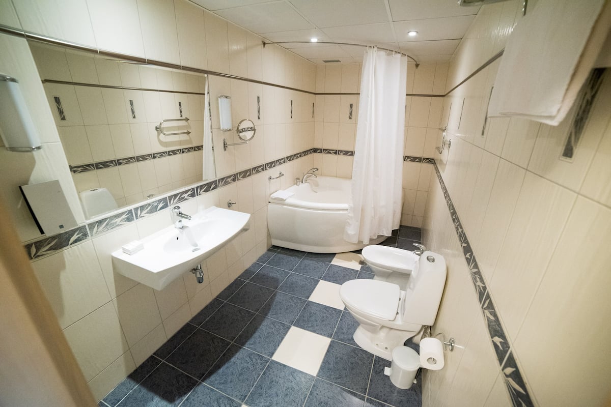 junior suite | bathroom | hair dryer, bathrobes, towels