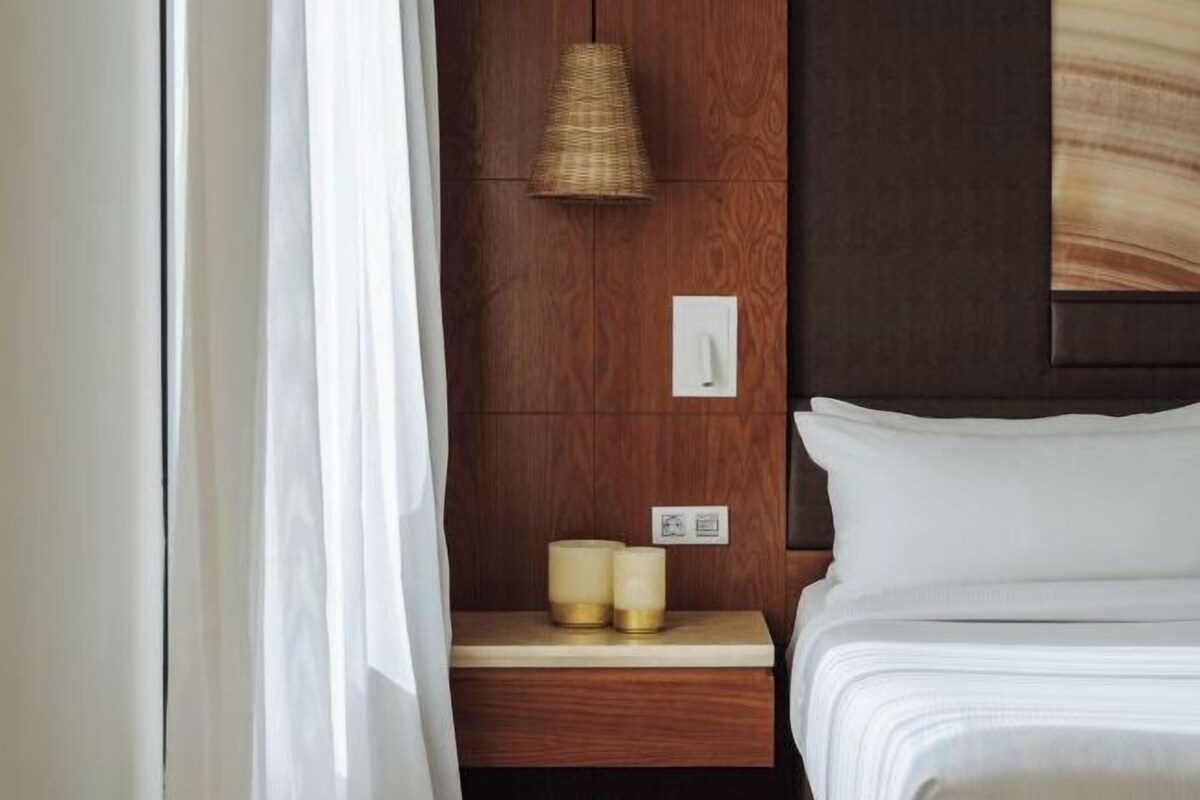 Couette en duvet d'oie, minibar, coffres-forts dans les chambres