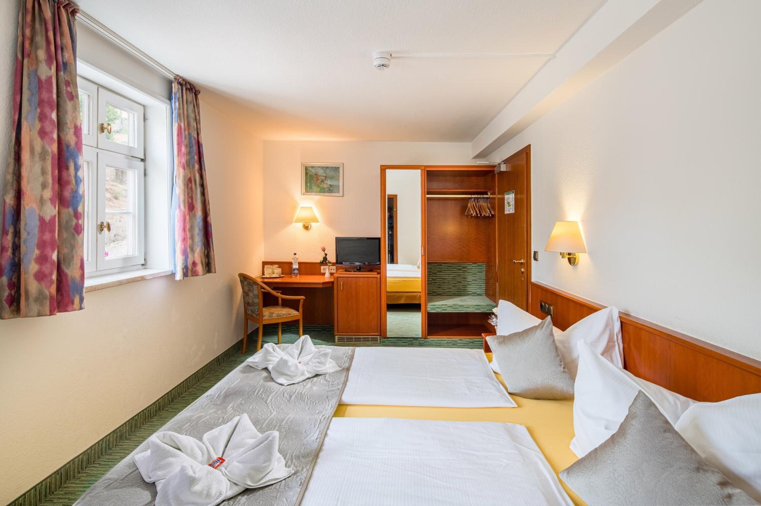 minibar, desk, free wifi, bed sheets