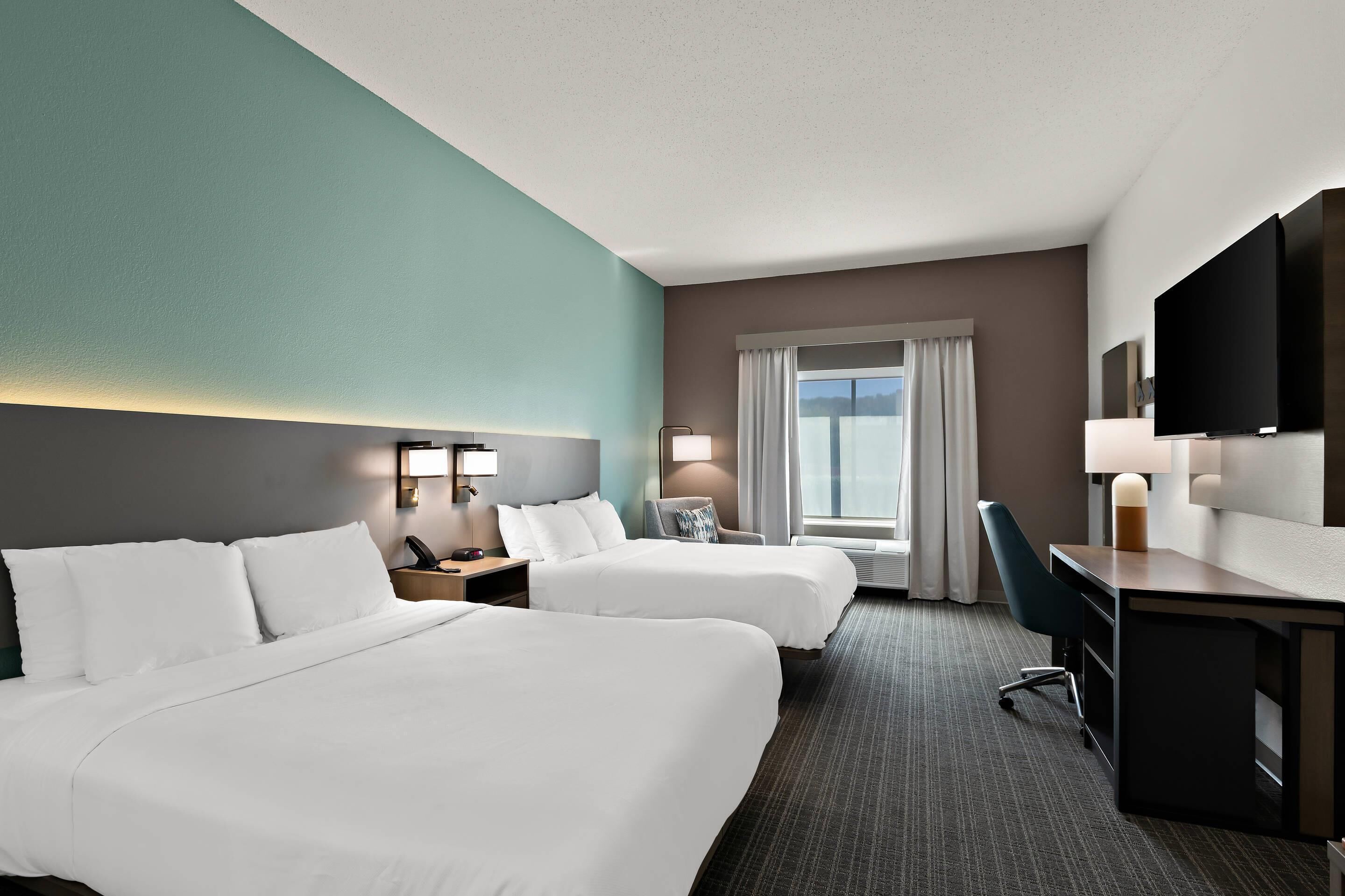 Standard Room, 2 Queen Beds, Non Smoking | Premium bedding, down duvets, pillow-top beds, desk