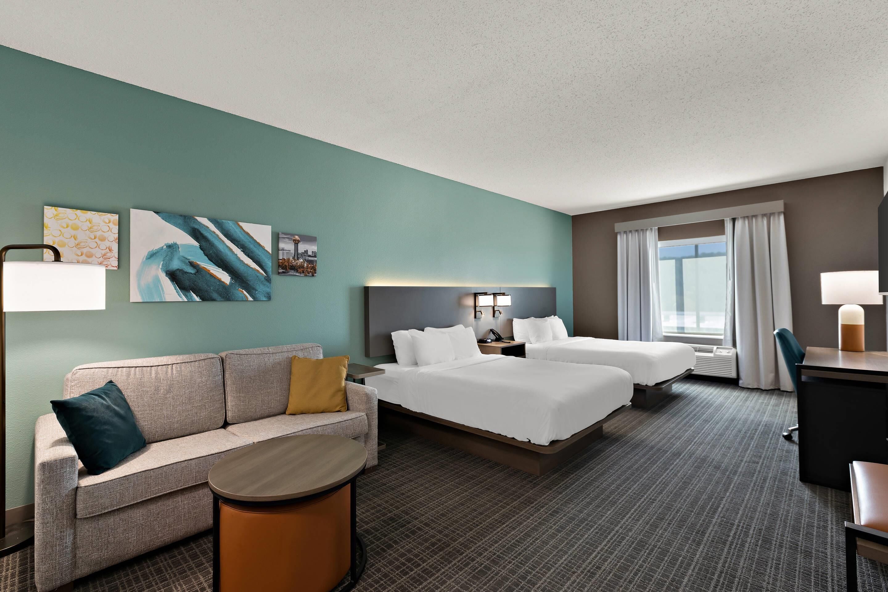 Suite, Multiple Beds, Non Smoking | Premium bedding, down comforters, pillowtop beds, desk