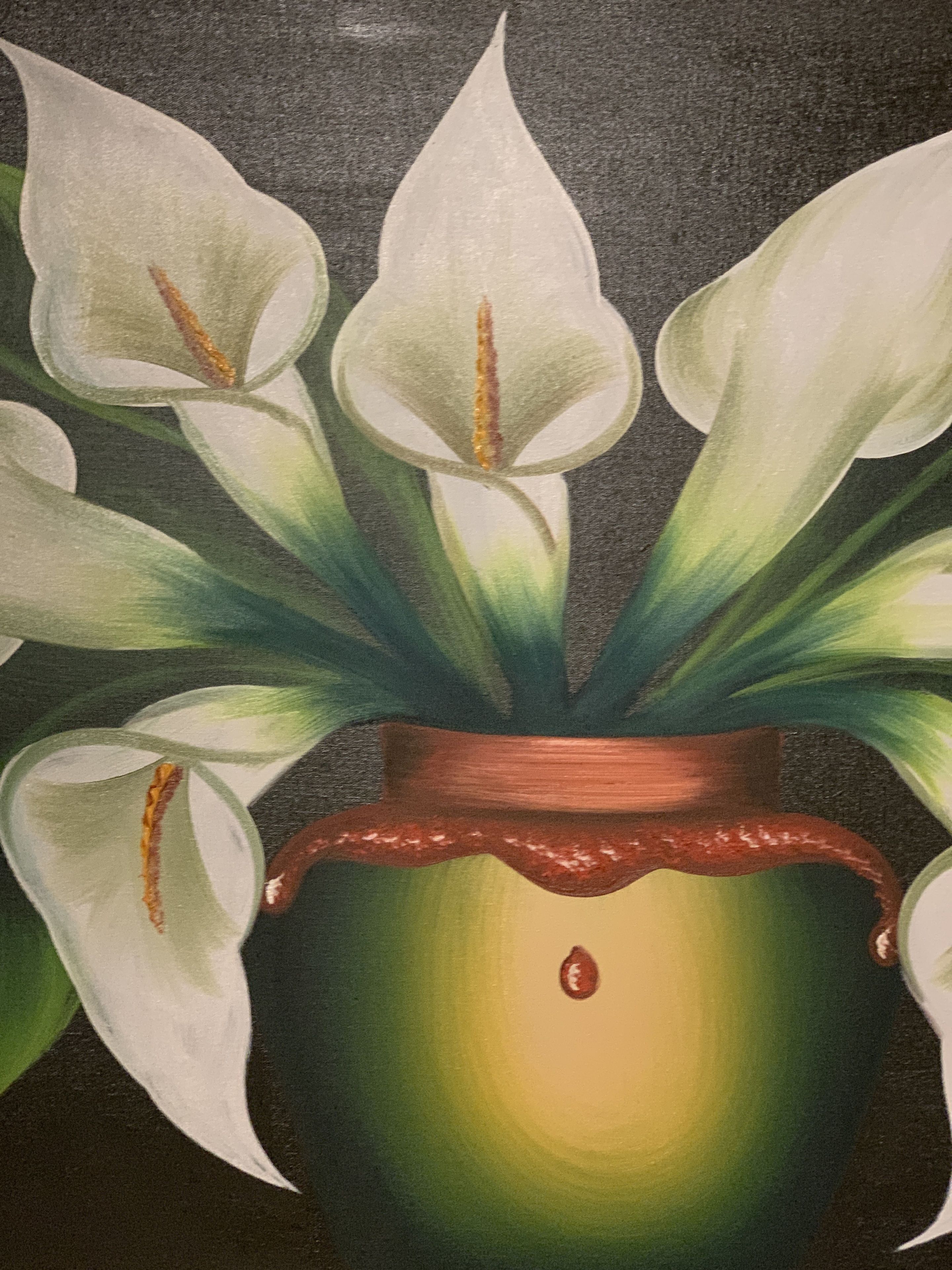 A potted plant with white flowers and a brown pot.