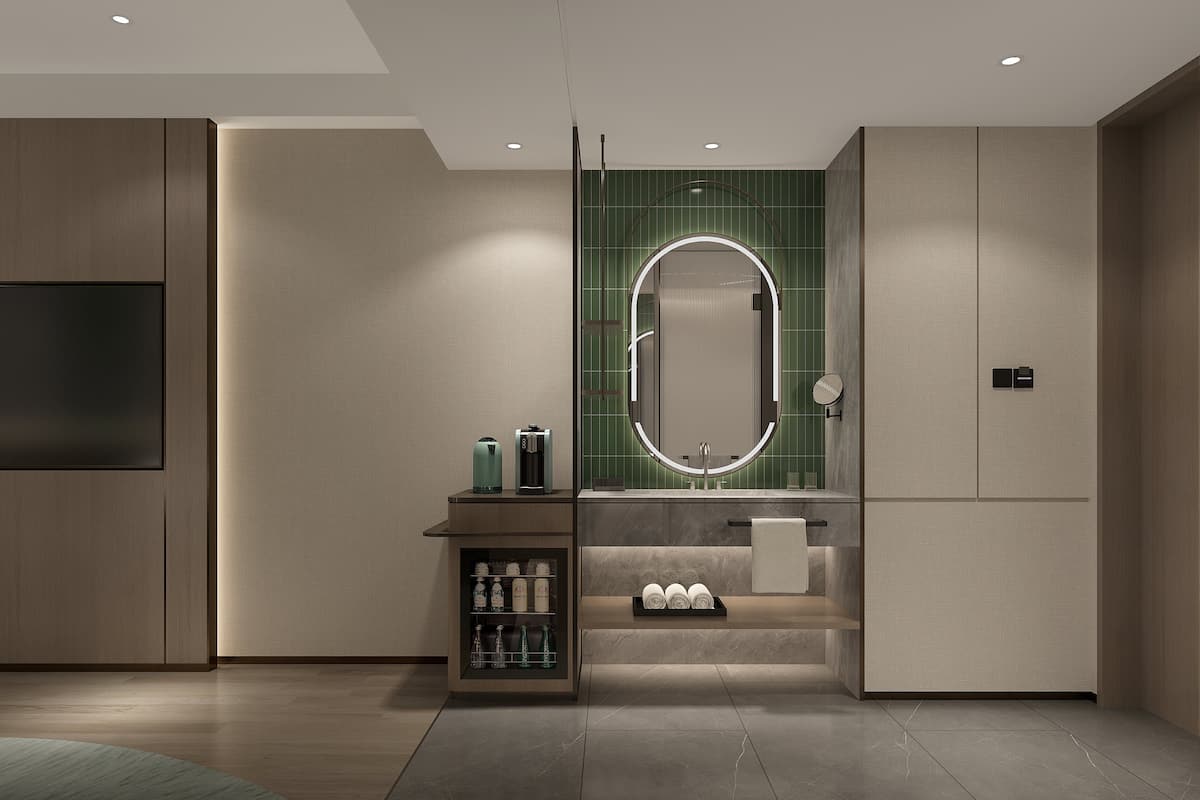 A modern bathroom with a vanity, mirror, and built-in shelves.