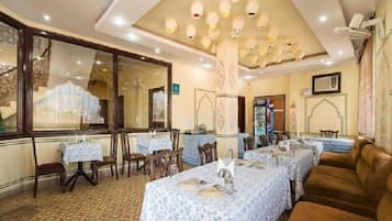 Breakfast, lunch, dinner served; Indian cuisine, al fresco dining