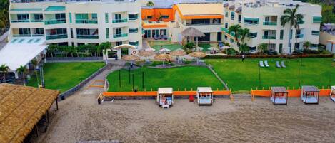 On the beach, beach umbrellas, beach towels, beach massages