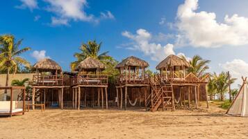 On the beach, beach umbrellas, beach towels, beach massages
