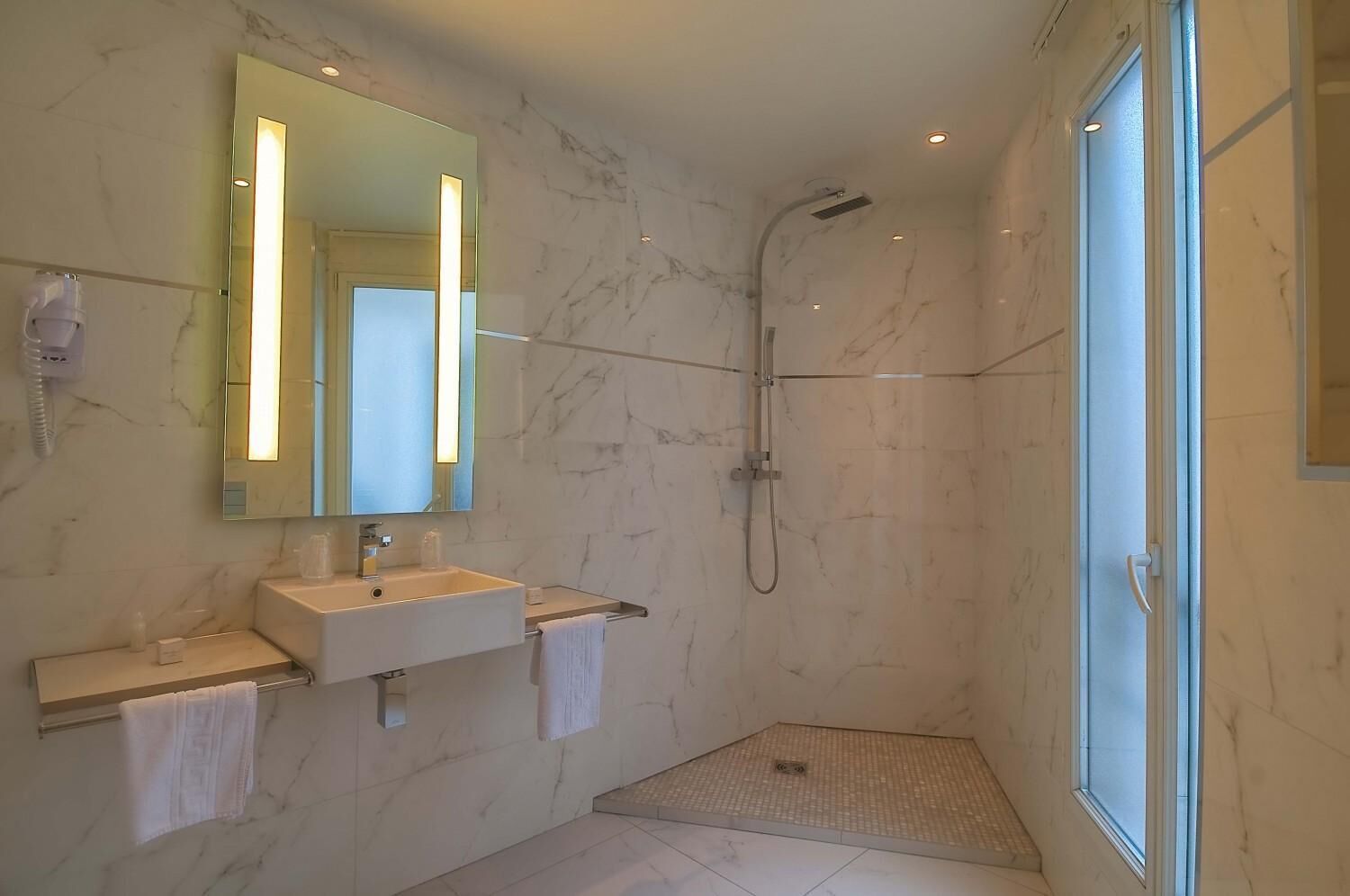 shower, hair dryer, towels