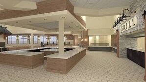 A modern kitchen area with a central island, a stone wall with a 'GRILL' sign, and a hexagonal tiled floor. - Hersey Farm Resort  (Ronks)
