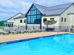 Outdoor pool, open 9:00 AM to 10:00 PM, pool umbrellas, sun loungers