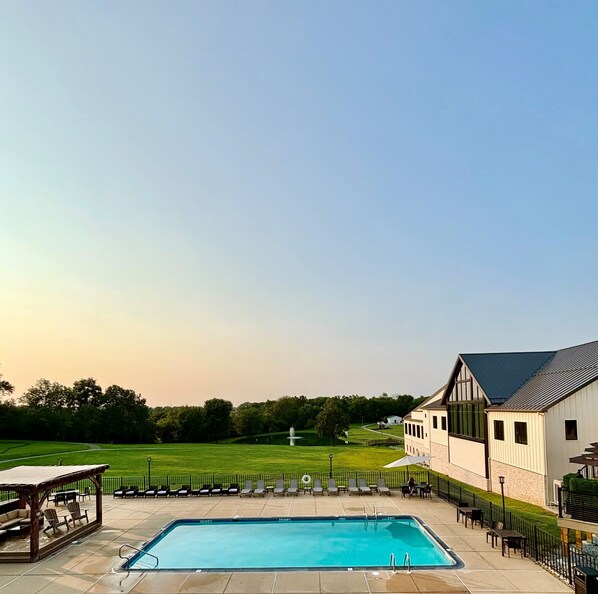 Outdoor pool, open 9:00 AM to 10:00 PM, pool umbrellas, sun loungers