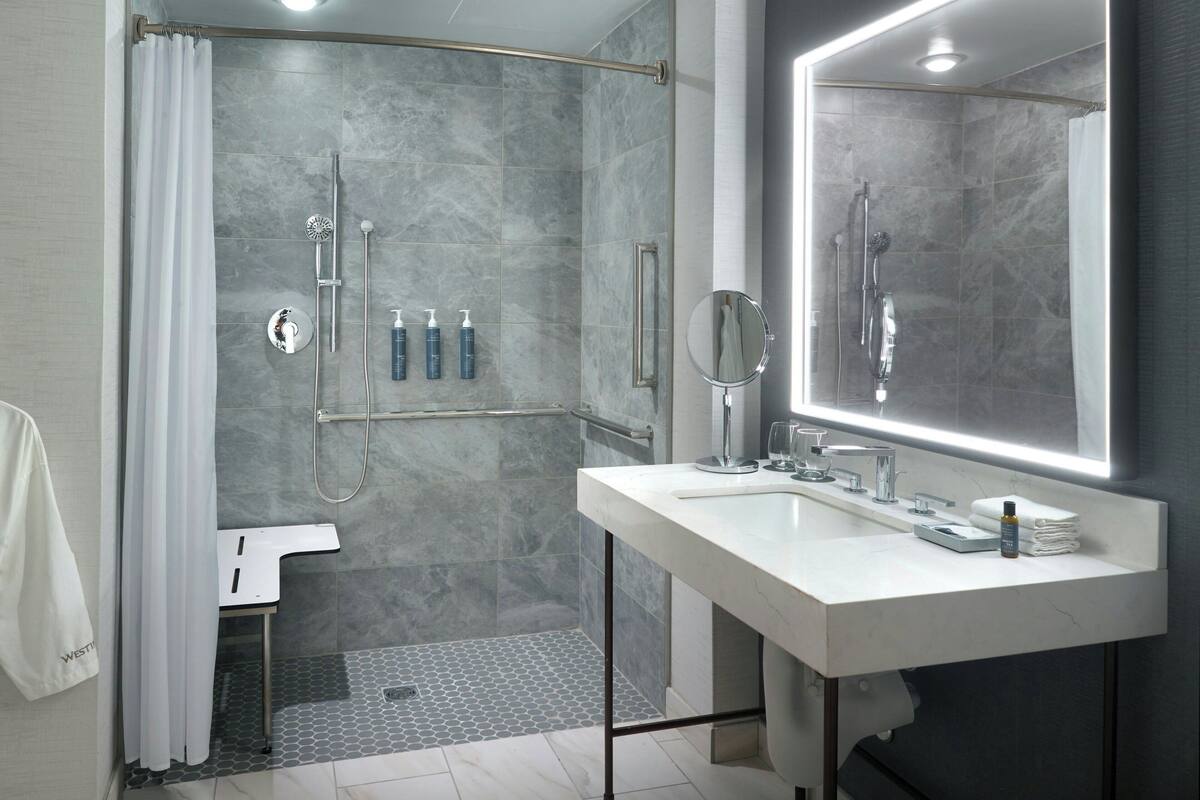 shower, free toiletries, hair dryer, towels