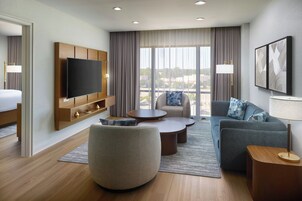 Executive Suite, 2 Bedrooms | Living room | Flat-screen TV, pay movies