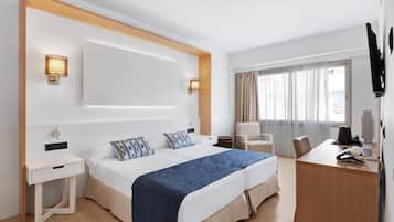 Habitación doble | Ropa de cama de alta calidad y minibar