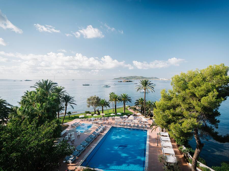 Indoor pool, outdoor pool, pool umbrellas, sun loungers