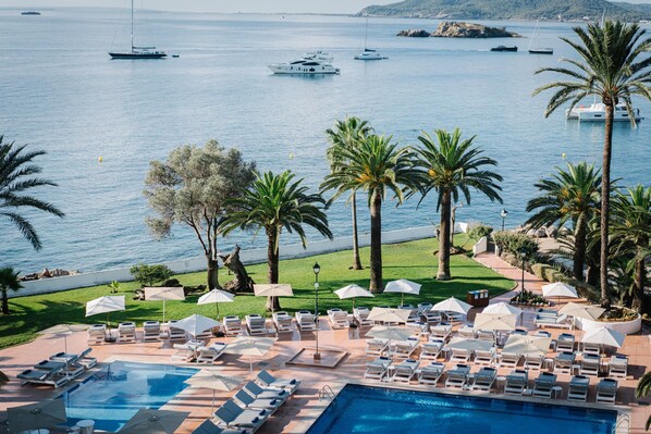 Indoor pool, outdoor pool, pool umbrellas, sun loungers