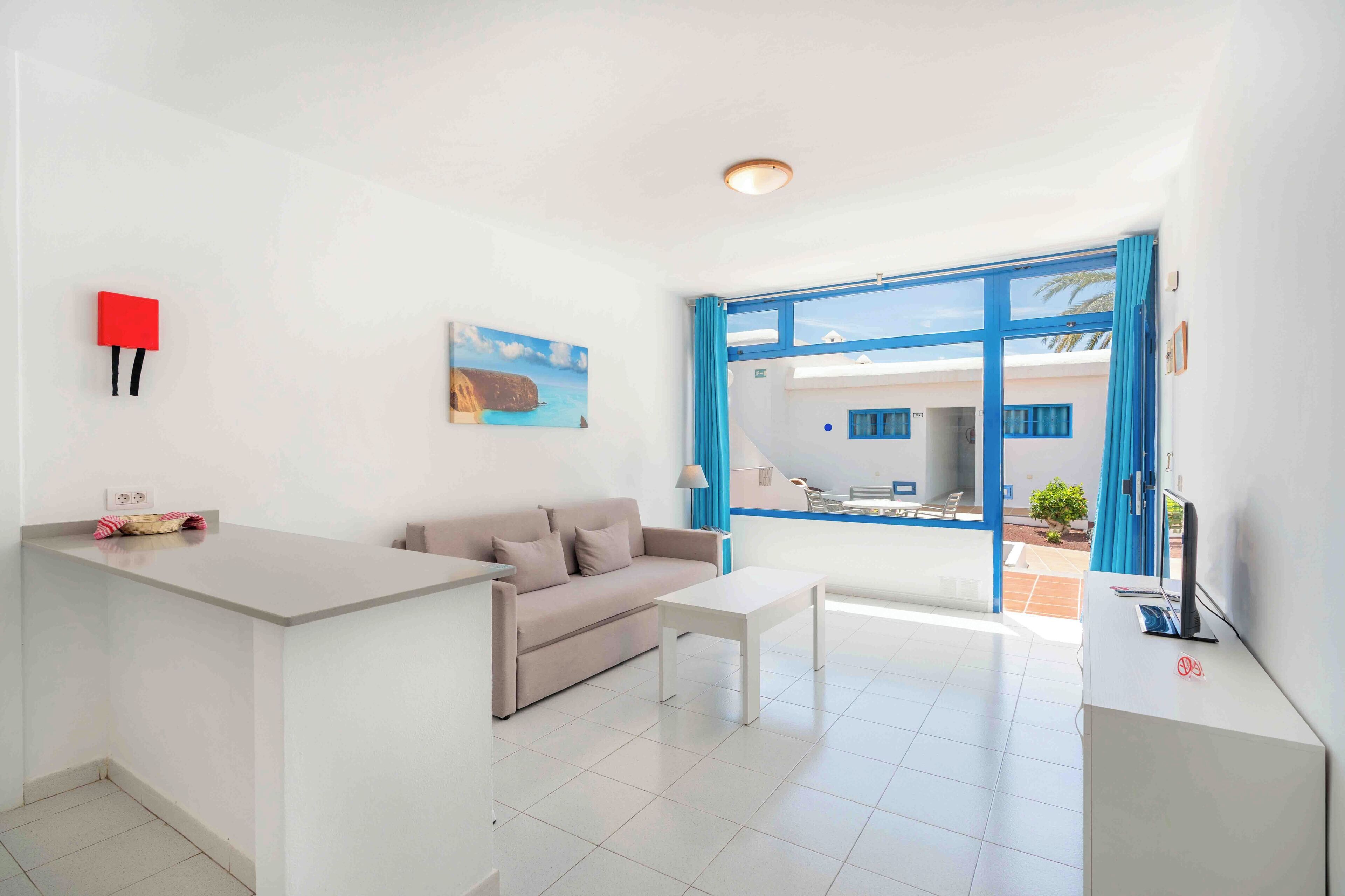 Standard Apartment, 1 Bedroom | Living area | 20-inch LED TV with satellite channels, TV