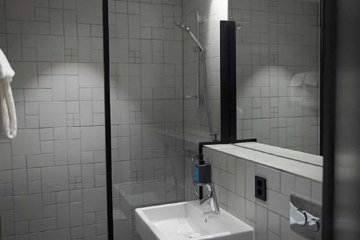 Bathroom | Shower, hair dryer, towels